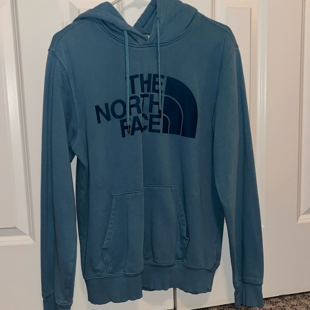 Lighter blue North Face sweatshirt